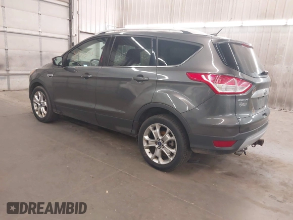 2015 Ford Escape Titanium with VIN 1FMCU9J96FUA43337, listed as a IAAI auction lot 41825328 with 149,639 mi miles and . Bid and sale history available at DreamBid. Image 3.
