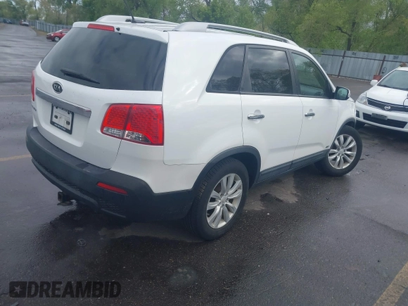 2011 Kia Sorento LX with VIN 5XYKTDA23BG060231, listed as a IAAI auction lot 42142538 with 166,884 mi miles. Bid and sale history available at carsss.com. Image 4.