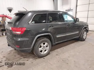 2011 Jeep Grand Cherokee 70th Anniversary with VIN 1J4RR4GG3BC745652, listed as a IAAI auction lot 41133698 with 217,948 mi miles. Bid and sale history available at carsss.com. Image 4.