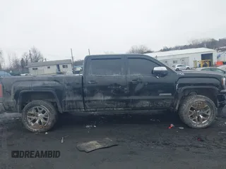 2018 GMC Sierra 1500 SLE z VIN 3GTU2MEC8JG249701, wystawiony jako IAAI lot #41556135 z przebiegiem 87 657 mil mil oraz . Historia ofert i sprzedaży dostępna na DreamBid. Obrazek 13.