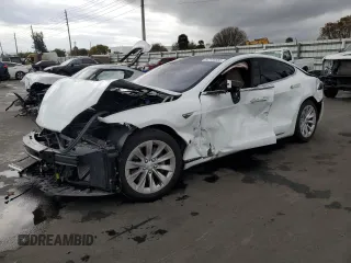 2016 Tesla Model S 70 with VIN 5YJSA1E10GF153812, listed as a Copart auction lot 52108565 with 90,938 mi miles and Non Repairable. Bid and sale history available at DreamBid. Image 1.