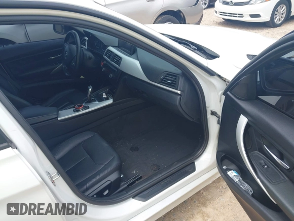 2012 BMW 3 Series 328i с VIN WBA3A5G56CNP15801, выставлен на аукционе IAAI как лот 42476836 с пробегом 166 614 миль миль и . История ставок и продаж доступна на DreamBid. Изображение 5.