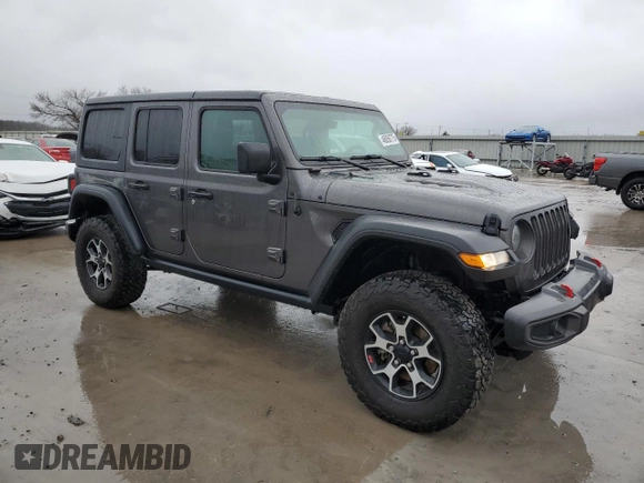 2023 Jeep Wrangler Rubicon with VIN 1C4HJXFN6PW509741, listed as a Copart auction lot 46056775 with 21,755 mi miles and Salvage title. Bid and sale history available at DreamBid. Image 4.