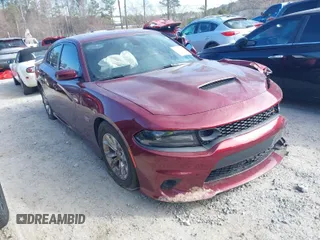 2021 Dodge Charger Scat Pack with VIN 2C3CDXGJXMH666975, listed as a IAAI auction lot 41649739 with 53,428 mi miles and . Bid and sale history available at DreamBid. Image 1.