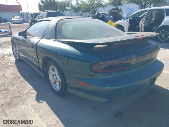 1996 Pontiac Firebird Formula with VIN 2G2FV22P5T2221912, listed as a IAAI auction lot 42004189 with 130,655 mi miles. Bid and sale history available at carsss.com. Image 3.