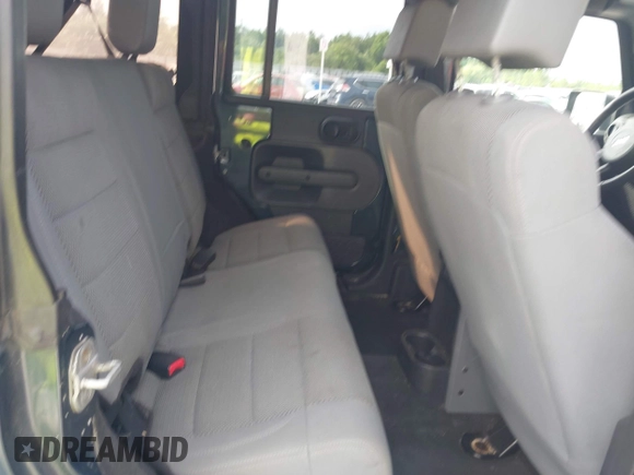 2007 Jeep Wrangler Unlimited Sahara with VIN 1J4GB59167L221686, listed as a IAAI auction lot 42473996 with 151,065 mi miles and . Bid and sale history available at DreamBid. Image 8.
