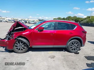 2018 Mazda CX-5 Grand Touring with VIN JM3KFADM0J0377091, listed as a IAAI auction lot 41677544 with 91,758 mi miles. Bid and sale history available at carsss.com. Image 15.