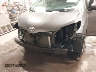 2011 Toyota Sienna LE with VIN 5TDJK3DC2BS013045, listed as a IAAI auction lot 41127037 with 239,401 mi miles. Bid and sale history available at carsss.com. Image 6.
