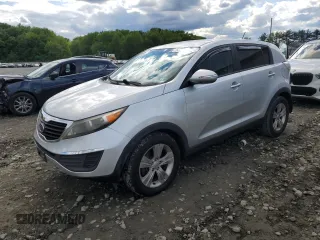 2012 Kia Sportage LX z VIN KNDPB3A26C7209328, wystawiony jako Copart lot #58122045 z przebiegiem 214 850 mil mil oraz Czysty tytuł • Clean title. Historia ofert i sprzedaży dostępna na DreamBid. Obrazek 1.