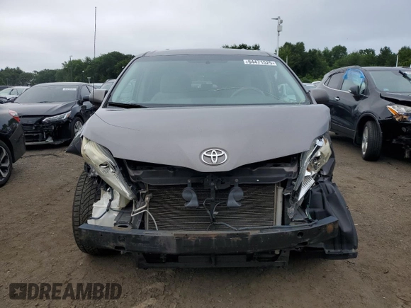 2014 Toyota Sienna LE AAS with VIN 5TDKK3DC9ES521442, listed as a Copart auction lot 64471525 with 331,395 mi miles and Salvage title. Bid and sale history available at DreamBid. Image 5.