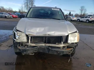 2006 GMC Envoy SLE with VIN 1GKDT13S262327772, listed as a Copart auction lot 85270134 with 242,390 mi miles and Salvage Title. Bid and sale history available at carsss.com. Image 5.