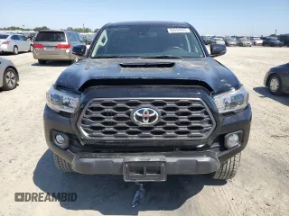 2023 Toyota Tacoma SR z VIN 3TMCZ5AN5PM533379, wystawiony jako Copart lot #55554265 z przebiegiem 31 776 mil mil oraz Szkoda całkowita • Salvage title. Historia ofert i sprzedaży dostępna na DreamBid. Obrazek 5.