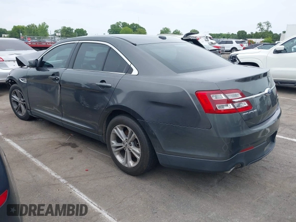 2015 Ford Taurus SEL with VIN 1FAHP2E81FG163058, listed as a IAAI auction lot 42221098 with 127,957 mi miles and . Bid and sale history available at carsss.com. Image 3.