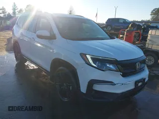 2021 Honda Pilot Special Edition with VIN 5FNYF5H26MB020491, listed as a IAAI auction lot 41218749 with 76,105 mi miles and . Bid and sale history available at carsss.com. Image 1.