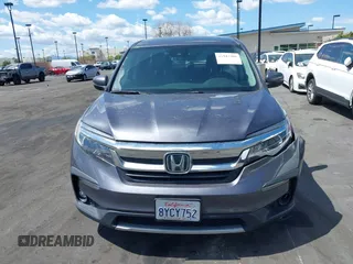 2021 Honda Pilot EX-L with VIN 5FNYF5H57MB046740, listed as a IAAI auction lot 41943366 with 31,198 mi miles and . Bid and sale history available at DreamBid. Image 13.