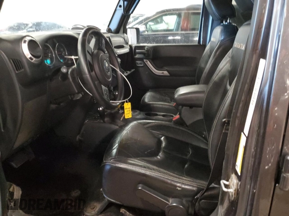 2014 Jeep Wrangler Unlimited Sahara z VIN 1C4BJWEG6EL183943, wystawiony jako Copart lot #48945325 z przebiegiem 171 711 mil mil oraz Czysty tytuł • Clean title. Historia ofert i sprzedaży dostępna na DreamBid. Obrazek 7.