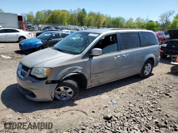 2013 Dodge Grand Caravan SXT with VIN 2C4RDGCG0DR582254, listed as a Copart auction lot 54735205 with 126,071 mi miles and Salvage Title. Bid and sale history available at DreamBid. Image 1.