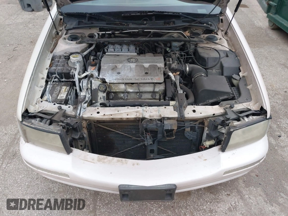 1998 Cadillac DeVille z VIN 1G6KD54YXWU800156, wystawiony jako IAAI lot #41820044 z przebiegiem Nie podano mil oraz . Historia ofert i sprzedaży dostępna na DreamBid. Obrazek 10.
