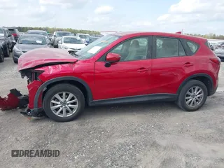 2016 Mazda CX-5 Sport with VIN JM3KE2BY9G0911535, listed as a IAAI auction lot 41906402 with 134,477 mi miles. Bid and sale history available at carsss.com. Image 15.