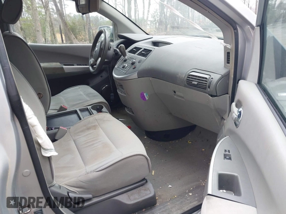 2009 Nissan Quest SL with VIN 5N1BV28U59N105982, listed as a IAAI auction lot 41795063 with 127,008 mi miles. Bid and sale history available at carsss.com. Image 5.