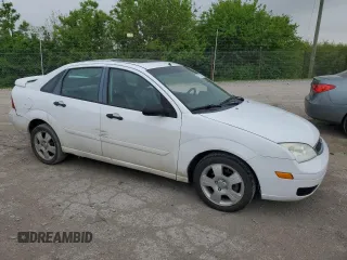 2007 Ford Focus S z VIN 1FAHP34N57W223198, wystawiony jako Copart lot #55725345 z przebiegiem 174 833 mil mil oraz Szkoda całkowita • Salvage title. Historia ofert i sprzedaży dostępna na DreamBid. Obrazek 4.