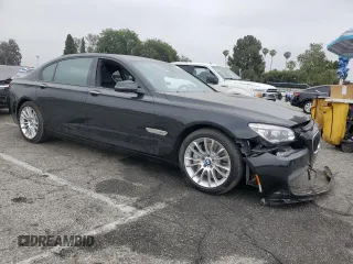 2015 BMW 7 Series 750Li with VIN WBAYE8C56FD782426, listed as a Copart auction lot 58208325 with 50,225 mi miles and Salvage title. Bid and sale history available at DreamBid. Image 4.