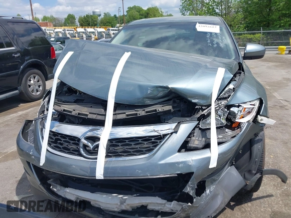 2012 Mazda CX-9 Touring z VIN JM3TB3CV0C0352698, wystawiony jako IAAI lot #42092613 z przebiegiem 75 118 mil mil oraz . Historia ofert i sprzedaży dostępna na DreamBid. Obrazek 12.