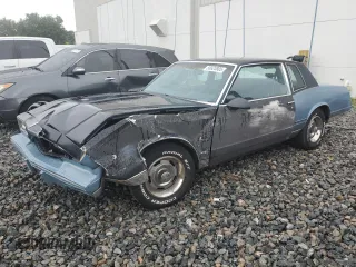 1986 Chevrolet Monte Carlo Sport с VIN 1G1GZ37Z1GR144715, выставлен на аукционе Copart как лот 56823805 с пробегом 99 278 миль миль и Списание • Salvage title. История ставок и продаж доступна на DreamBid. Изображение 1.