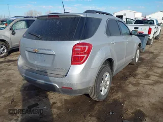 2016 Chevrolet Equinox LT with VIN 2GNALCEK5G6164747, listed as a IAAI auction lot 41684370 with 100,412 mi miles and . Bid and sale history available at DreamBid. Image 4.