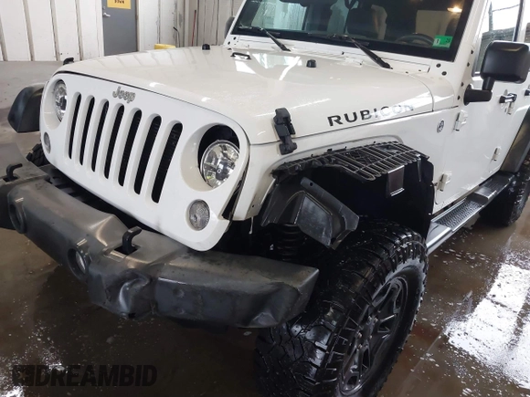 2016 Jeep Wrangler Unlimited Rubicon with VIN 1C4HJWFG4GL127379, listed as a IAAI auction lot 41732688 with 110,193 mi miles. Bid and sale history available at carsss.com. Image 17.