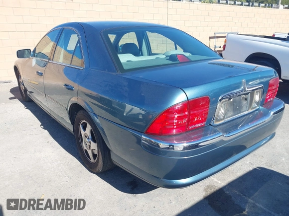 2001 Lincoln LS w/Base Pkg with VIN 1LNHM87A31Y617332, listed as a IAAI auction lot 41317767 with 141,931 mi miles. Bid and sale history available at carsss.com. Image 3.