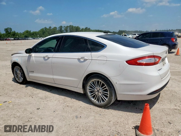 2014 Ford Fusion SE Hybrid with VIN 3FA6P0LU1ER110489, listed as a Copart auction lot 58364095 with 112,605 mi miles and Salvage title. Bid and sale history available at DreamBid. Image 2.