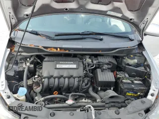 2010 Honda Insight EX with VIN JHMZE2H74AS032878, listed as a Copart auction lot 56230795 with 125,838 mi miles and Clean title. Bid and sale history available at DreamBid. Image 11.