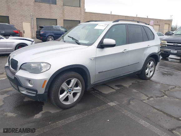 2007 BMW X5 3.0si with VIN 5UXFE43597L017476, listed as a IAAI auction lot 41459147 with 184,494 mi miles. Bid and sale history available at carsss.com. Image 2.