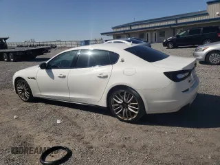 2014 Maserati Quattroporte GTS z VIN ZAM56PPA3E1074957, wystawiony jako Copart lot #52321115 z przebiegiem 113 584 mil mil oraz Szkody całkowita. Historia ofert i sprzedaży dostępna na DreamBid. Obrazek 2.