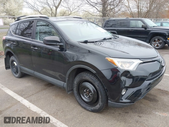 2016 Toyota RAV4 LE with VIN 2T3BFREV3GW447802, listed as a IAAI auction lot 41985438 with 213,247 mi miles. Bid and sale history available at carsss.com. Image 1.