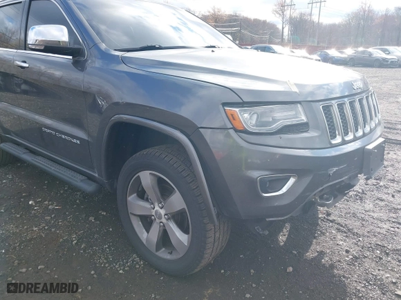 2014 Jeep Grand Cherokee Overland with VIN 1C4RJFCG5EC329377, listed as a IAAI auction lot 40822324 with 106,222 mi miles. Bid and sale history available at carsss.com. Image 18.