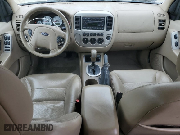 2005 Ford Escape Limited z VIN 1FMYU04195KB37679, wystawiony jako Copart lot #50656585 z przebiegiem 218 891 mil mil oraz Szkoda całkowita • Salvage title. Historia ofert i sprzedaży dostępna na DreamBid. Obrazek 8.