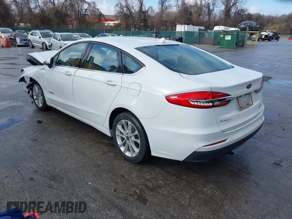 2019 Ford Fusion Hybrid SE with VIN 3FA6P0LUXKR104850, listed as a IAAI auction lot 41870242 with 114,943 mi miles. Bid and sale history available at carsss.com. Image 3.