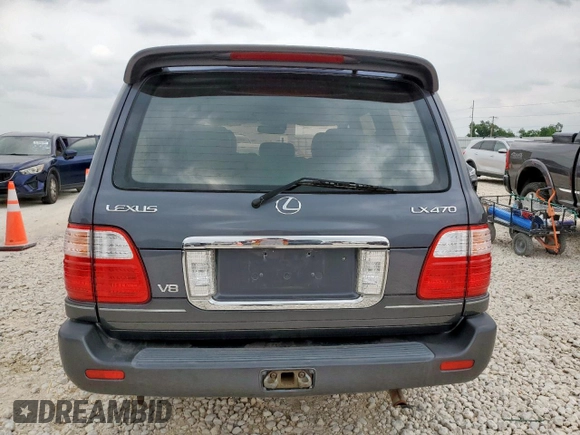 2003 Lexus LX 470 z VIN JTJHT00W033530306, wystawiony jako Copart lot #57162675 z przebiegiem 185 458 mil mil oraz Szkoda całkowita • Salvage title. Historia ofert i sprzedaży dostępna na DreamBid. Obrazek 6.
