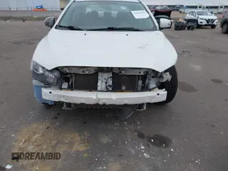 2016 Mitsubishi Lancer SE with VIN JA32V2FWXGU003619, listed as a IAAI auction lot 41041665 with 98,627 mi miles. Bid and sale history available at carsss.com. Image 6.