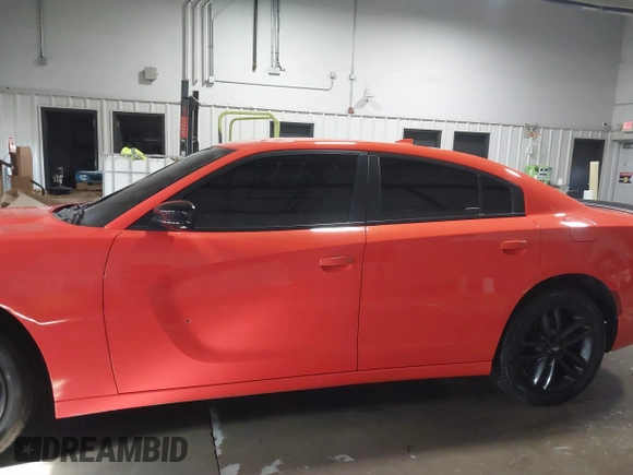 2019 Dodge Charger SXT with VIN 2C3CDXJG8KH712474, listed as a IAAI auction lot 41228985 with 117,229 mi miles and . Bid and sale history available at DreamBid. Image 6.