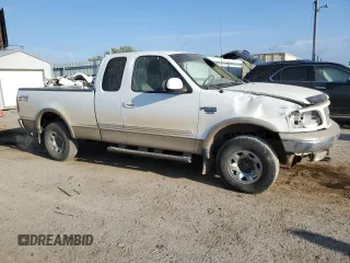 1999 Ford F-250 with VIN 1FTPX28L2XNC27238, listed as a Copart auction lot 70415914 with Not provided miles and Salvage title. Bid and sale history available at DreamBid. Image 4.