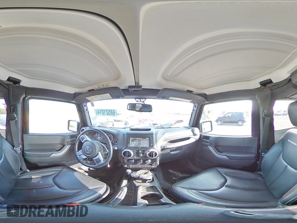 2015 Jeep Wrangler Rubicon Hard Rock z VIN 1C4BJWCG9FL714606, wystawiony jako Copart lot #68521014 z przebiegiem 35 187 mil mil oraz Szkoda całkowita • Salvage title. Historia ofert i sprzedaży dostępna na DreamBid. Obrazek 13.