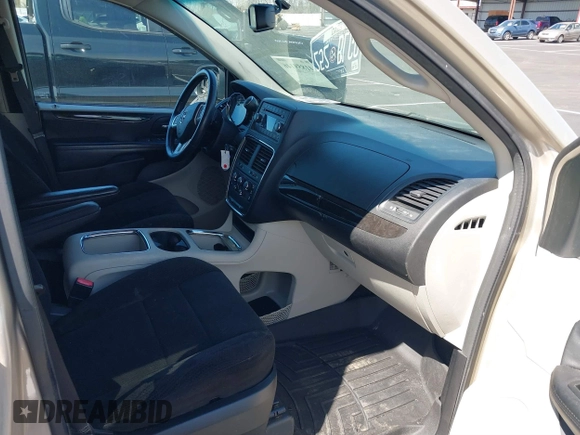 2013 Dodge Grand Caravan SXT with VIN 2C4RDGCGXDR635008, listed as a IAAI auction lot 41859146 with 133,119 mi miles and . Bid and sale history available at DreamBid. Image 5.