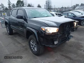 2017 Toyota Tacoma SR5 with VIN 3TMAZ5CN5HM043482, listed as a IAAI auction lot 41613811 with 114,795 mi miles. Bid and sale history available at carsss.com. Image 1.