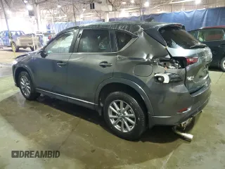 2024 Mazda CX-5 S Carbon Edition z VIN JM3KFBCL7R0405124, wystawiony jako Copart lot #84849344 z przebiegiem 10 811 mil mil oraz Szkoda całkowita • Salvage title. Historia ofert i sprzedaży dostępna na DreamBid. Obrazek 2.