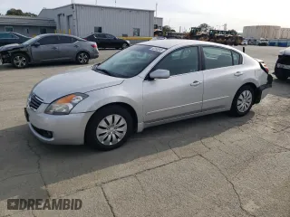 2009 Nissan Altima 2.5 S with VIN 1N4AL21E69N453854, listed as a Copart auction lot 52053095 with 101,211 mi miles and Salvage Title. Bid and sale history available at carsss.com. Image 1.