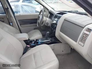 2009 Ford Escape Hybrid with VIN 1FMCU49319KA88009, listed as a IAAI auction lot 42065410 with 239,319 mi miles. Bid and sale history available at carsss.com. Image 5.