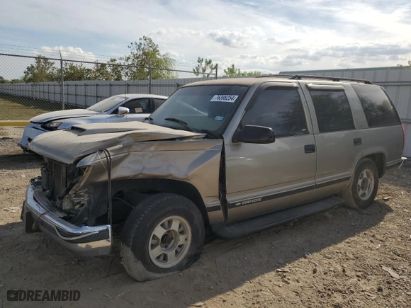 1999 Chevrolet Tahoe with VIN 1GNEC13R6XJ494812, listed as a Copart auction lot 76398254 with 299,584 mi miles and Salvage Title. Bid and sale history available at carsss.com. Image 1.